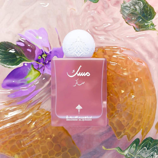 Worood Oud Fragrances Sugar Musk Perfume in a sleek pink bottle with floral design, perfect for everyday wear