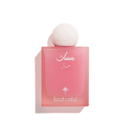 Worood Oud Fragrances Sugar Musk Perfume in a sleek pink bottle with an ornate white cap for a sweet floral scent
